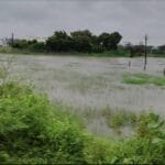 వ్యవసాయ భూముల్లో వరద.. సాగుచేసేదేలా..?అస్తవ్యస్తంగా మారిన ఎర్రచెరువు వరద కాలువ..నీటిలో మునిగిన రైతుల భూములు..మా పరిధి కాదంటూ చేతులు దులుపుకొంటున్న అధికారులుఆందోళనలో రైతులు.. పట్టించుకునే నాథుడు కరువు..